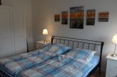 Schlafzimmer mit Doppelbett