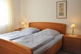Schlafzimmer mit Doppelbett