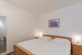 Schlafbereich mit Doppelbett