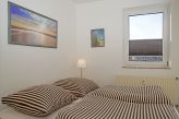 Separates Schlafzimmer mit Doppelbett