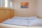 Schlafzimmer mit Doppelbett