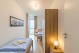 Schlafzimmer 1 mit 2 Einzelbetten